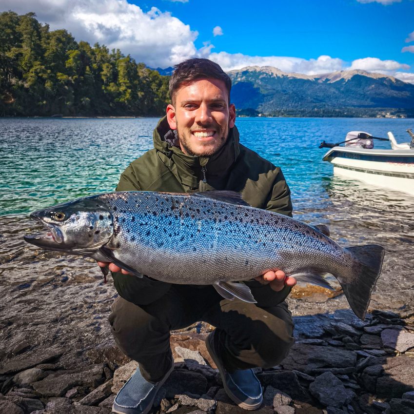 client with a trout on Lake Nahuel Huapi during a half-day trip